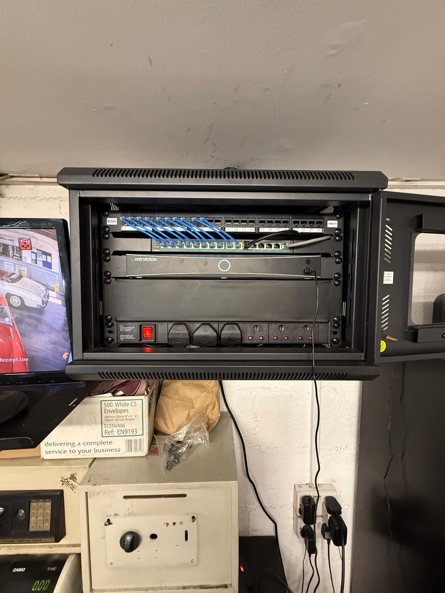 Commercial CCTV infrastructure and network rack installed across the United Kingdom